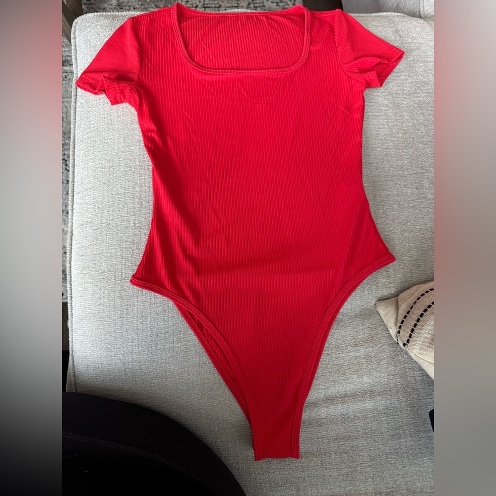 red bodysuit